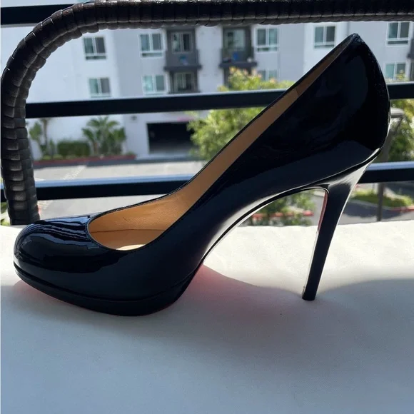 Christian Louboutin in premium leather, these heels feature a classic pump style